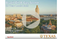 Title slide from Carla Lacerda's presentation at UT Energy Symposium, with text giving presentation title, speaker name, date over an arial view of UT campus