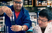 two students work in a laboratory