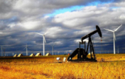 Wind turbines behind an oil pump