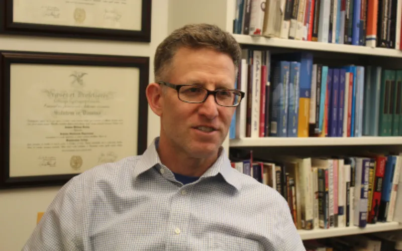 Prof Josh Busby in his office at the LBJ School of Public Affairs